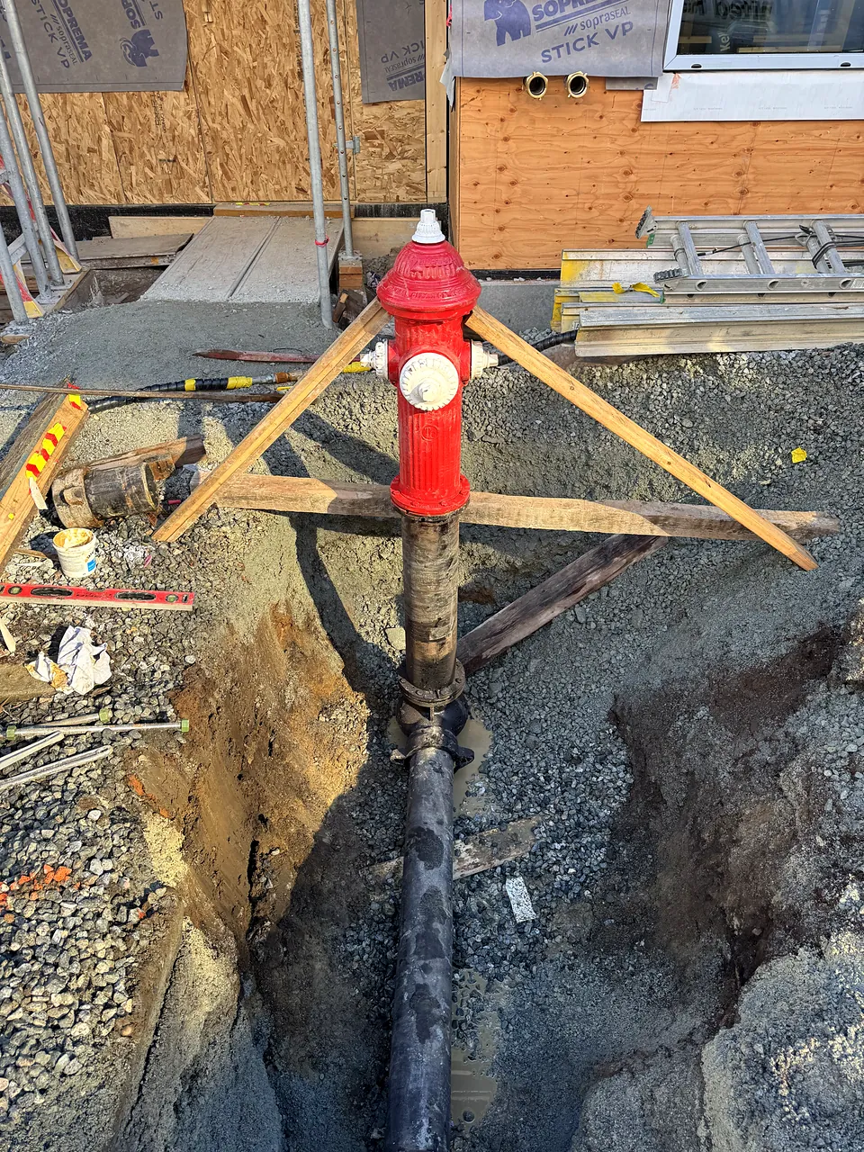 New fire hydrant and ductile iron lead in an open trench