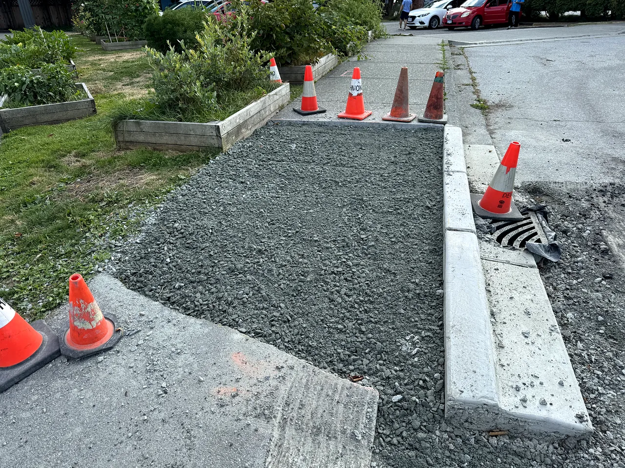 New concrete curb with prepared gravel base
