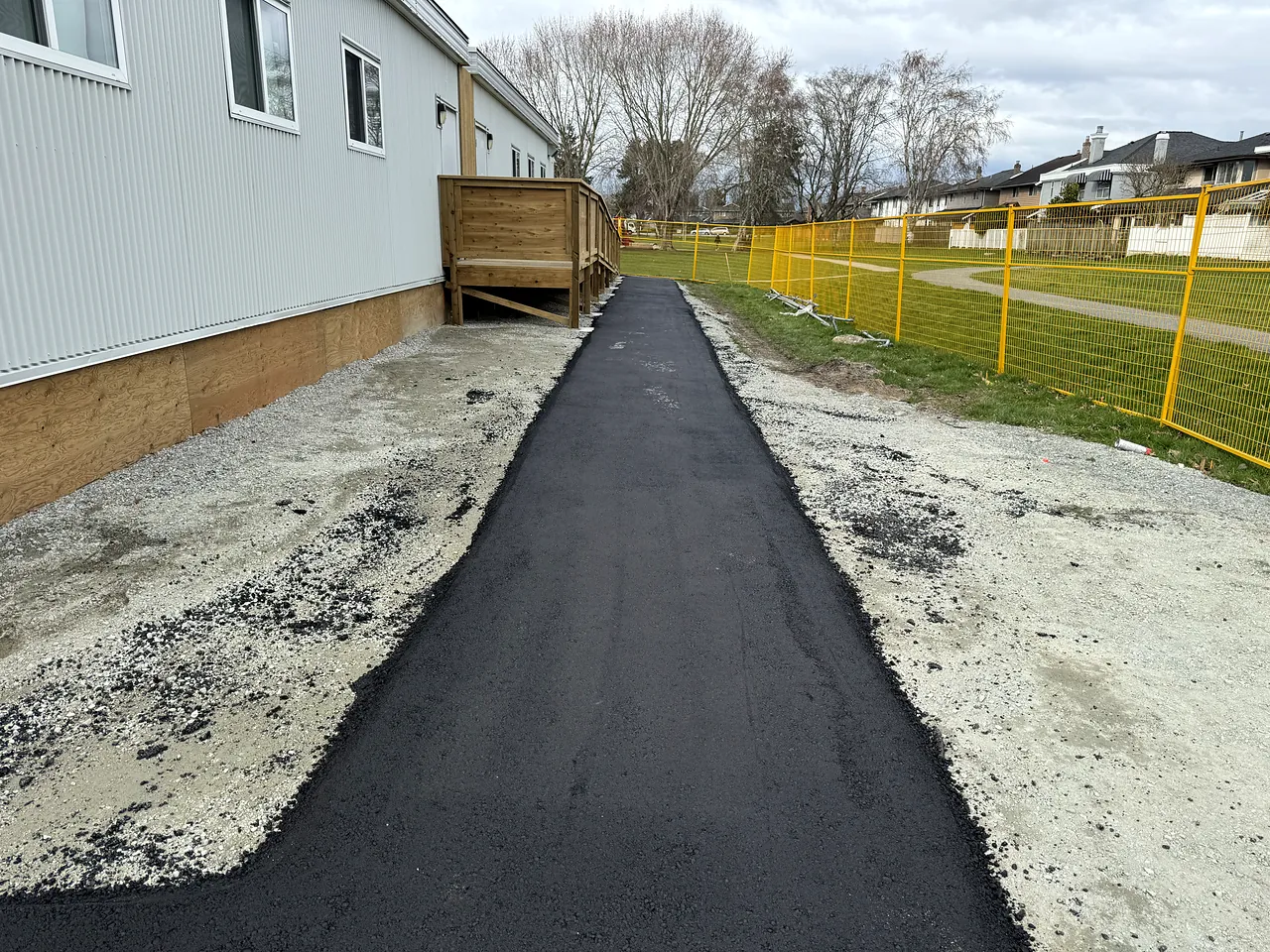 New paved walkway along the portable classrooms