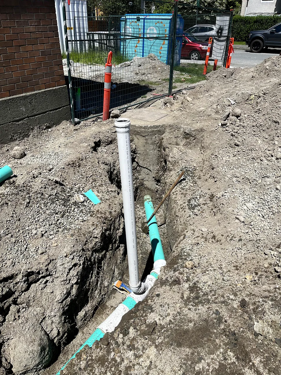 New storm pipe and cleanout in an open trench