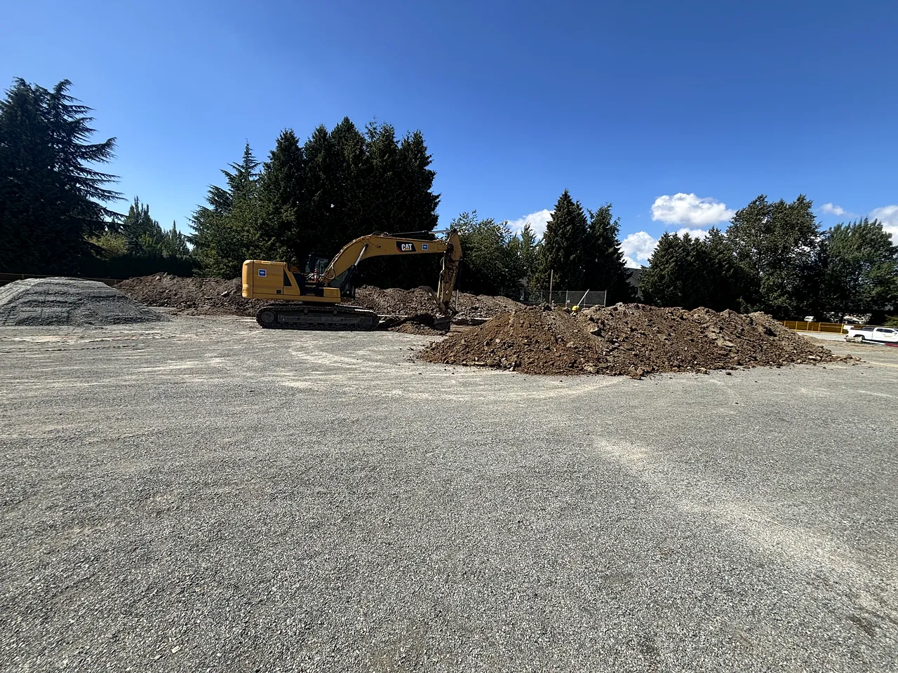NSC excavator stripping and stockpiling on the school site