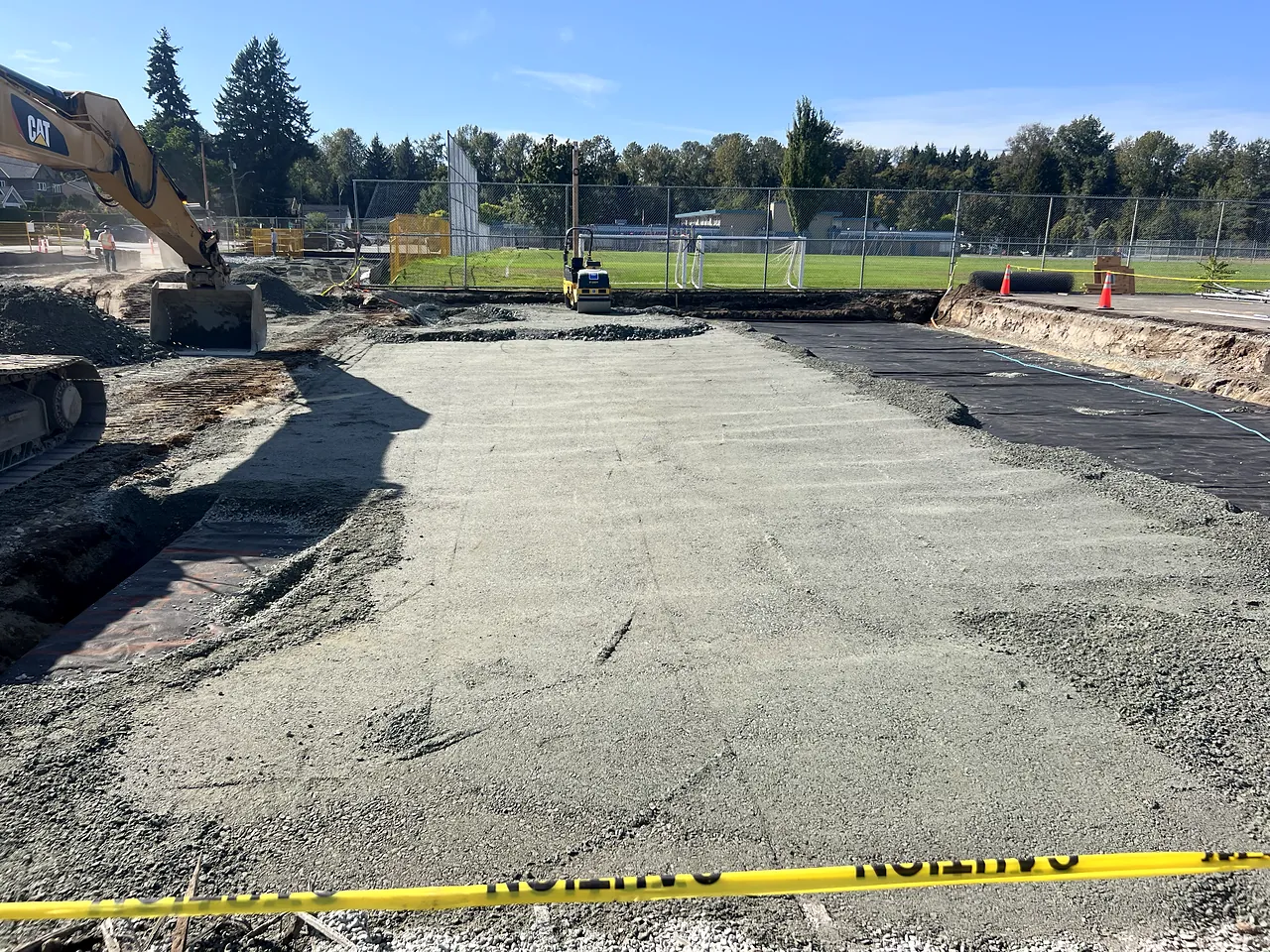 Graded building pad beside the field at Guildford Park Secondary
