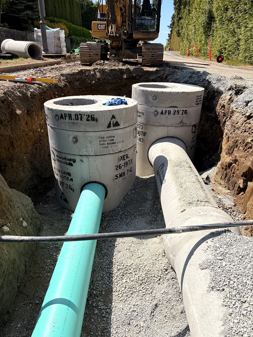 New sanitary and storm manholes with PVC and concrete pipe on Kingston Road