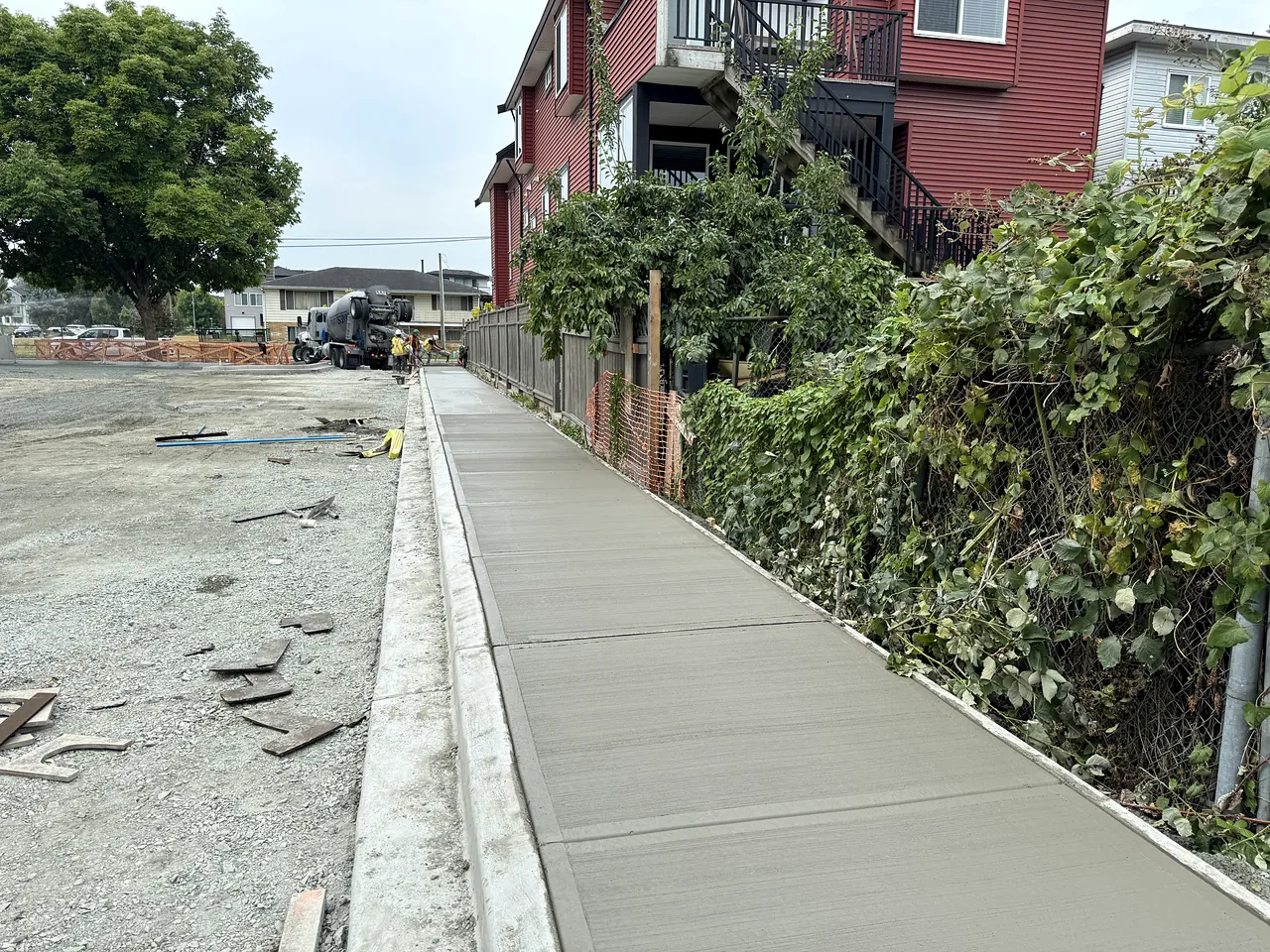 New curb and sidewalk on the street frontage