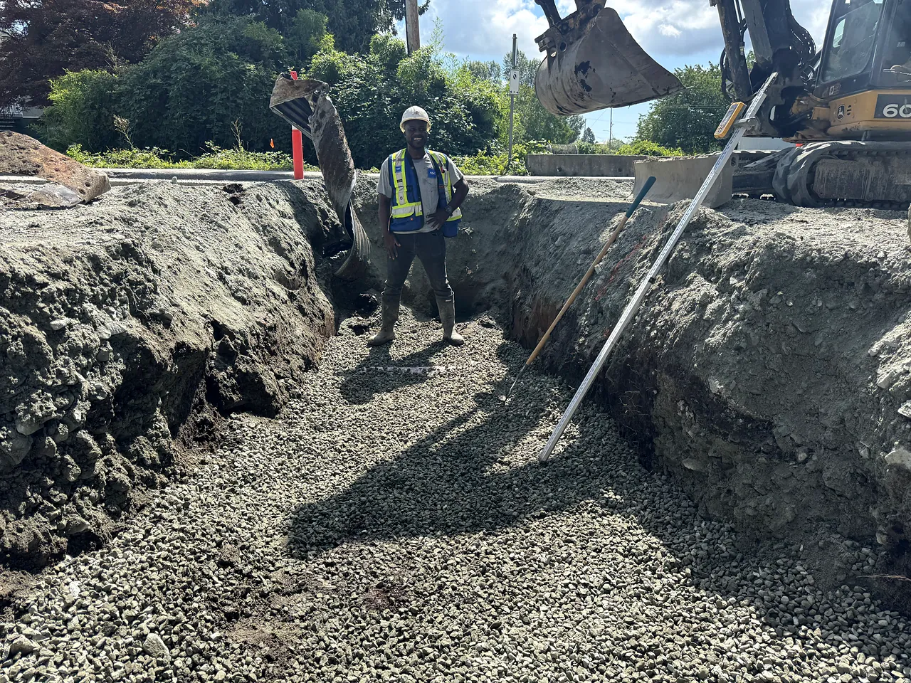 NSC crew member in a deep trench on the Queen Elizabeth road works